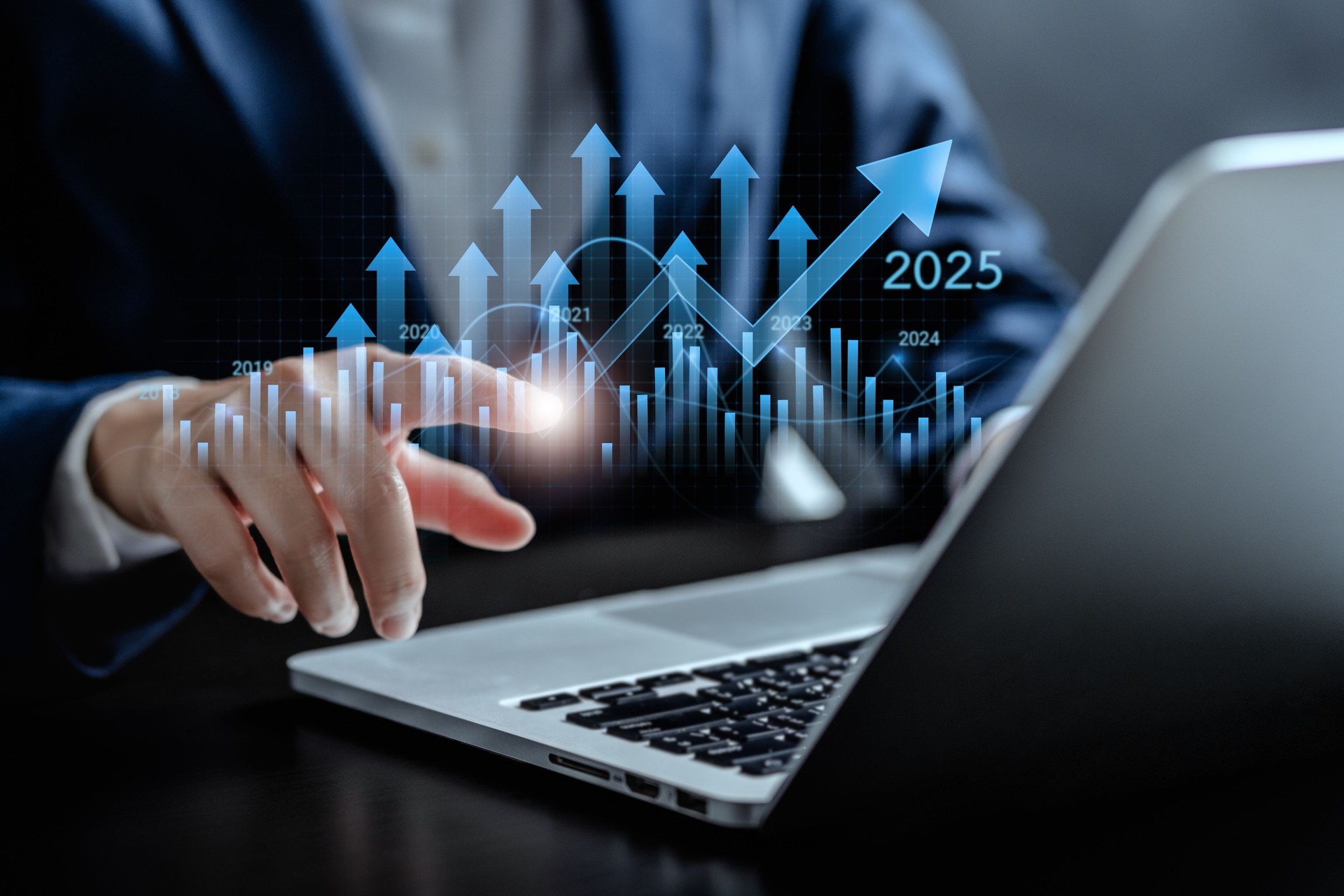 Businesswomen pointing to arrow up virtual to forecast and analyze the stock market and economic with virtual chart,  trend upside business market growth, investments and financial concept.